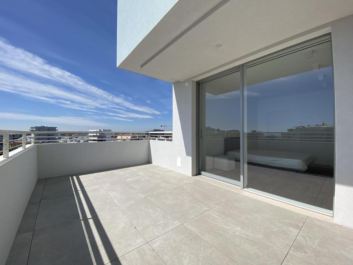 Podium Apartment ลิโดดิเยโซโล ภายนอก รูปภาพ