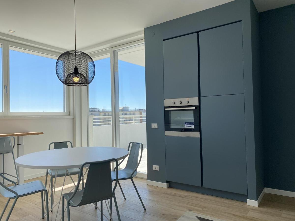 Podium Apartment ลิโดดิเยโซโล ภายนอก รูปภาพ