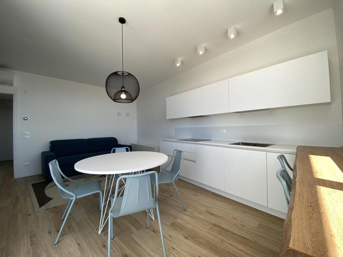 Podium Apartment ลิโดดิเยโซโล ภายนอก รูปภาพ