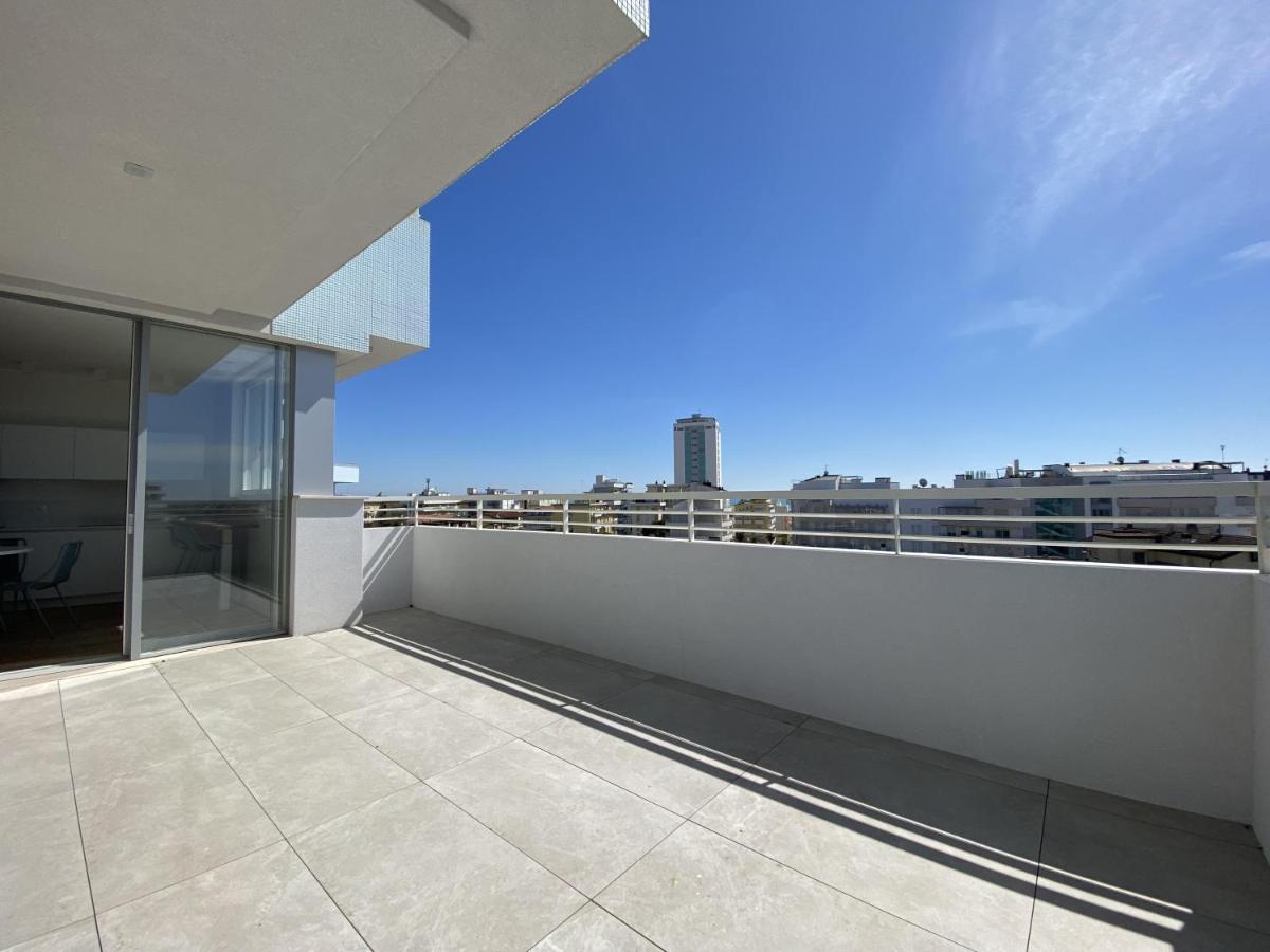 Podium Apartment ลิโดดิเยโซโล ภายนอก รูปภาพ