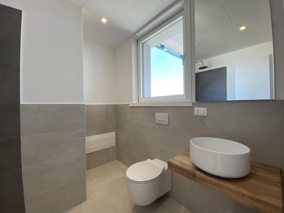 Podium Apartment ลิโดดิเยโซโล ภายนอก รูปภาพ