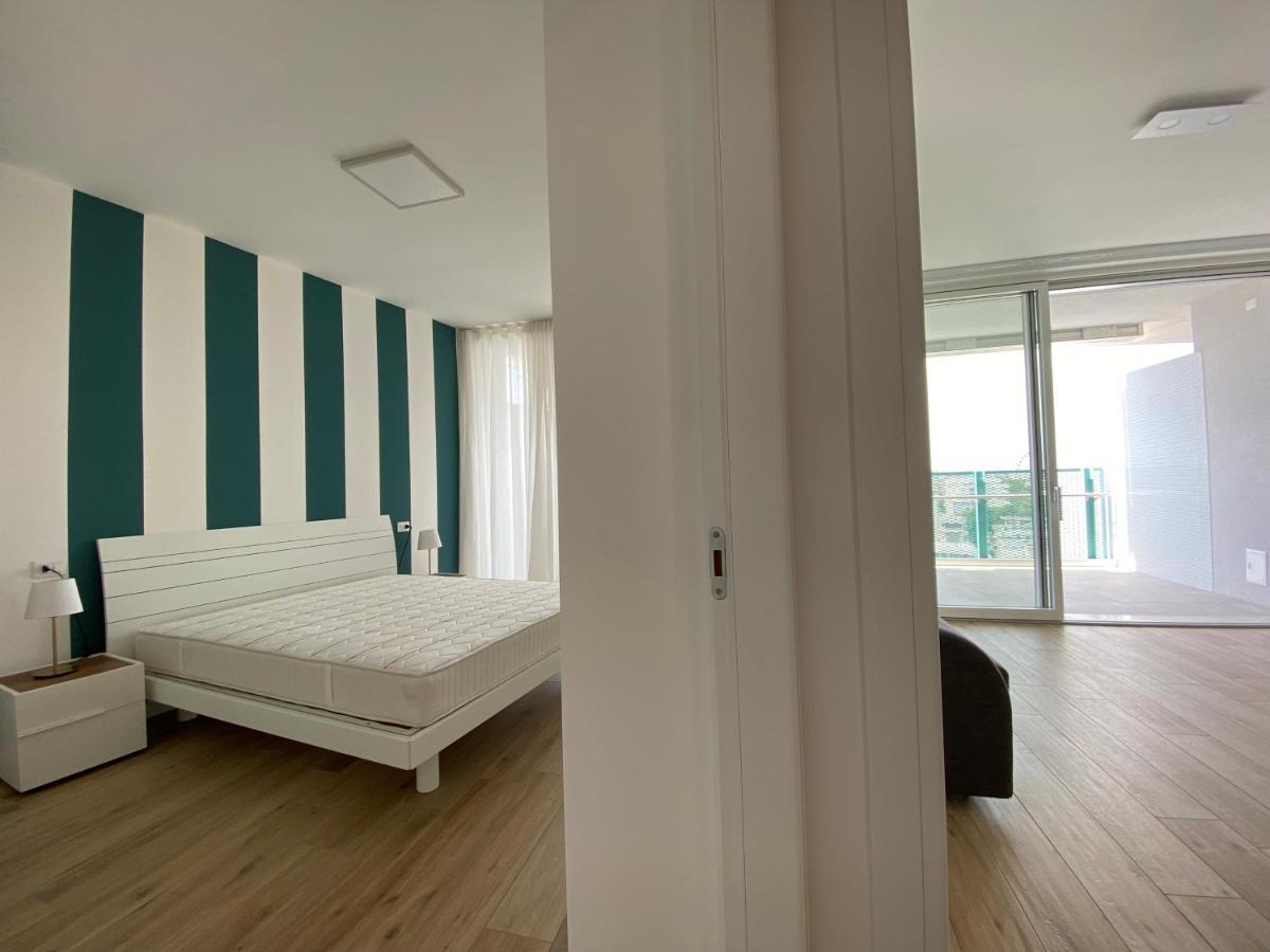 Podium Apartment ลิโดดิเยโซโล ภายนอก รูปภาพ