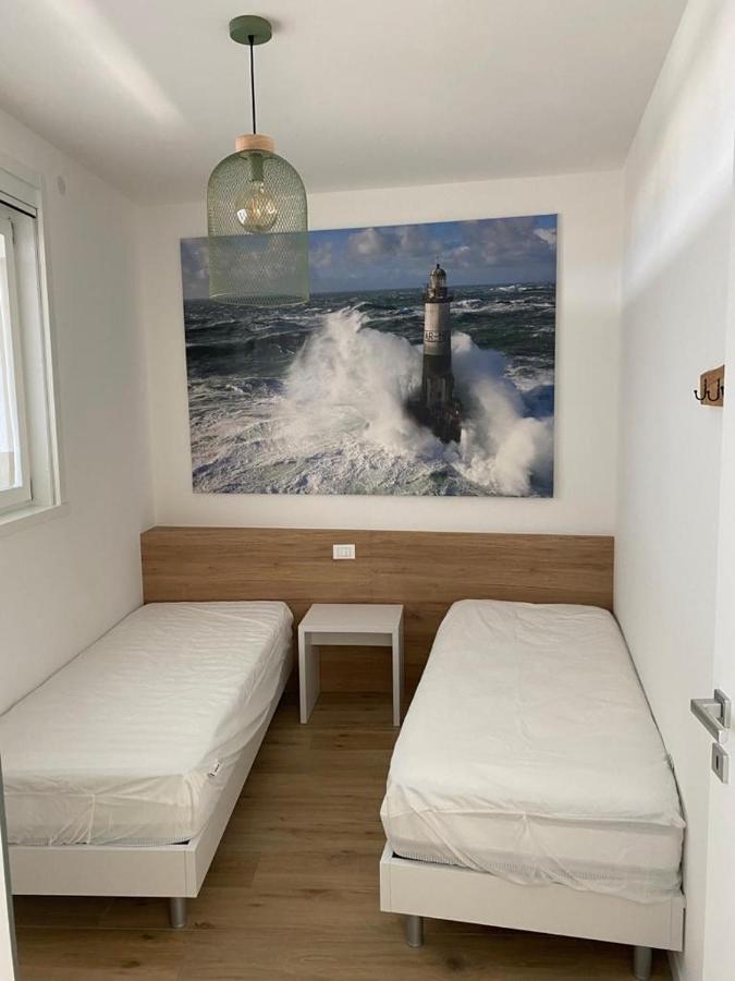 Podium Apartment ลิโดดิเยโซโล ภายนอก รูปภาพ