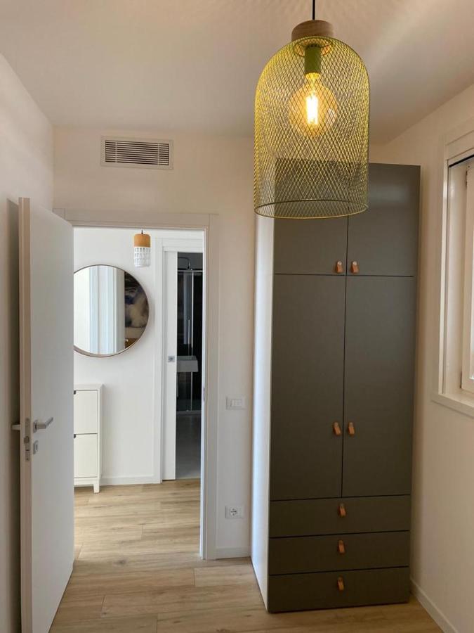 Podium Apartment ลิโดดิเยโซโล ภายนอก รูปภาพ