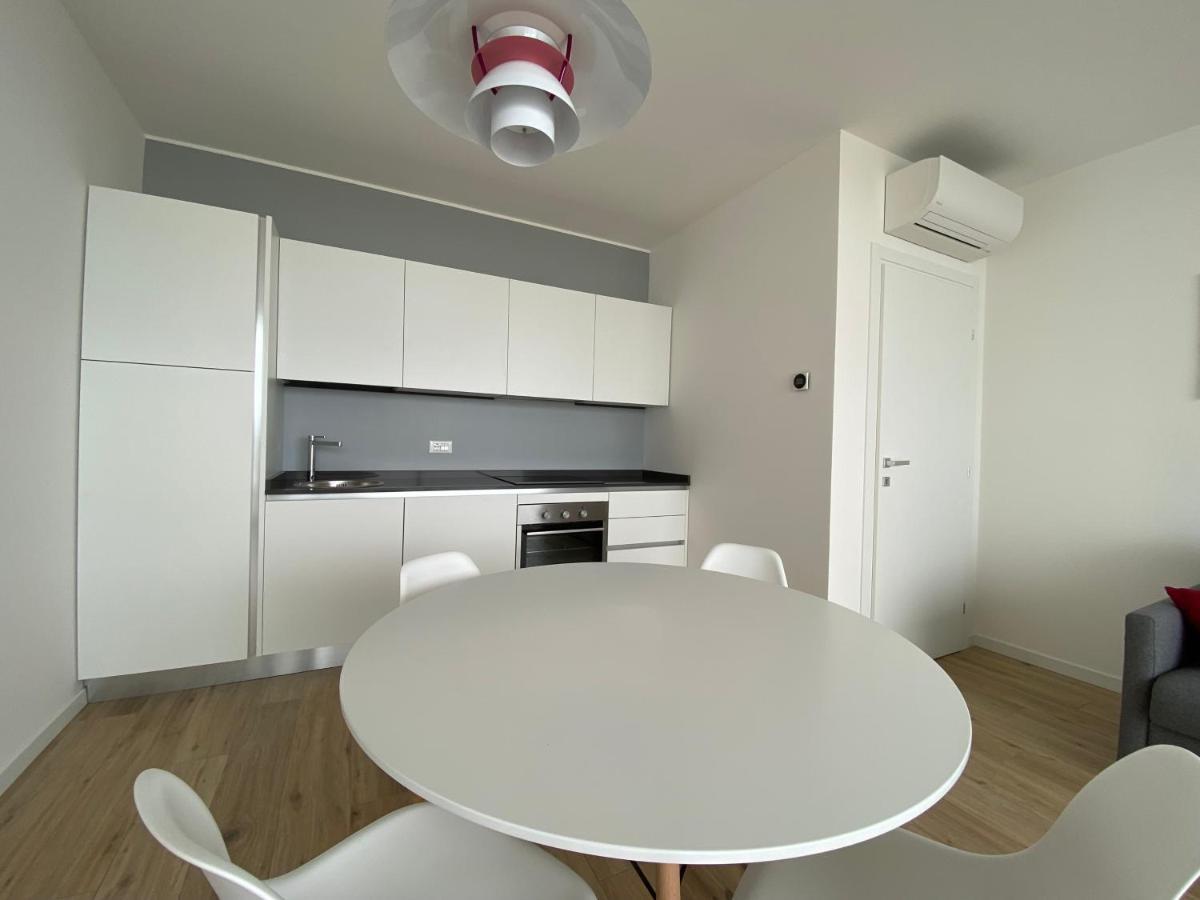 Podium Apartment ลิโดดิเยโซโล ภายนอก รูปภาพ