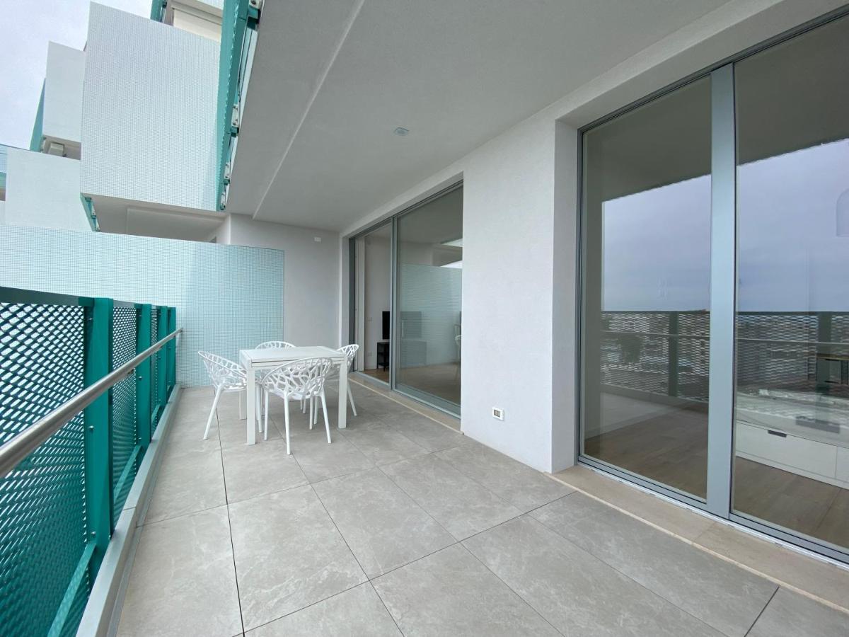 Podium Apartment ลิโดดิเยโซโล ภายนอก รูปภาพ