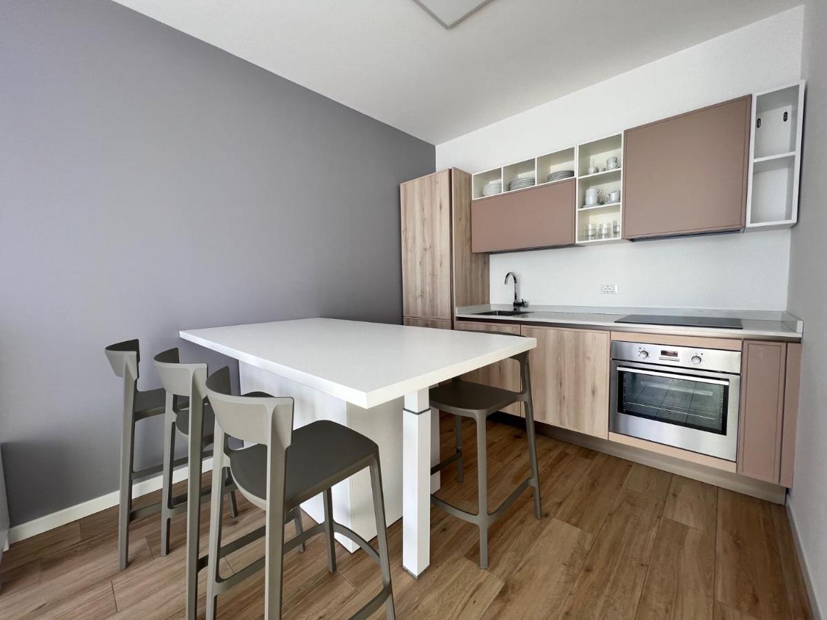 Podium Apartment ลิโดดิเยโซโล ภายนอก รูปภาพ
